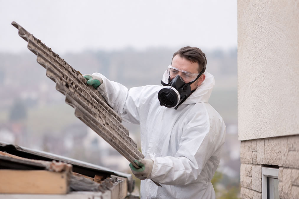 Professional asbestos removal service in a UK property